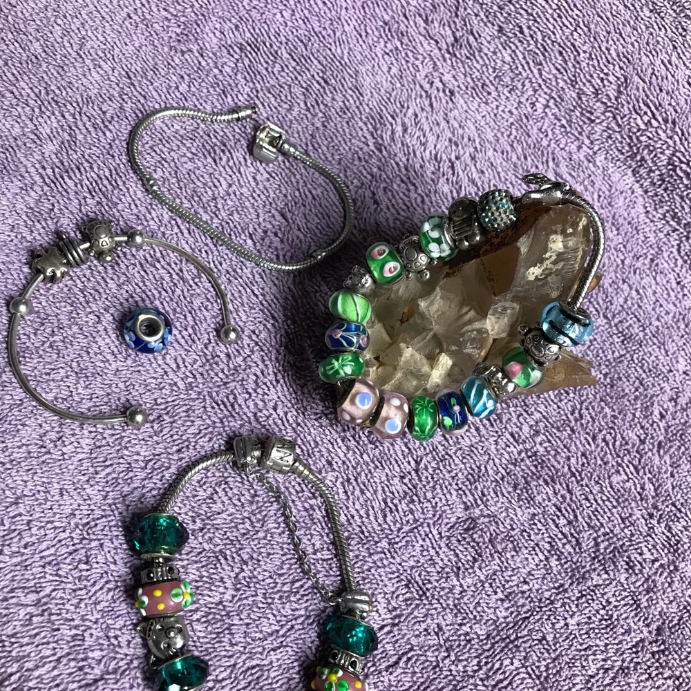 Pandora Bracelet with extra Pandora glass beads and extra bracelet starts